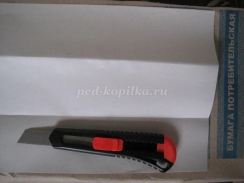 Как сделать шапку из газеты: пошаговая инструкция 06